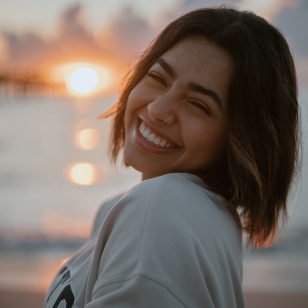 Client Mia L. testimonial portrait
